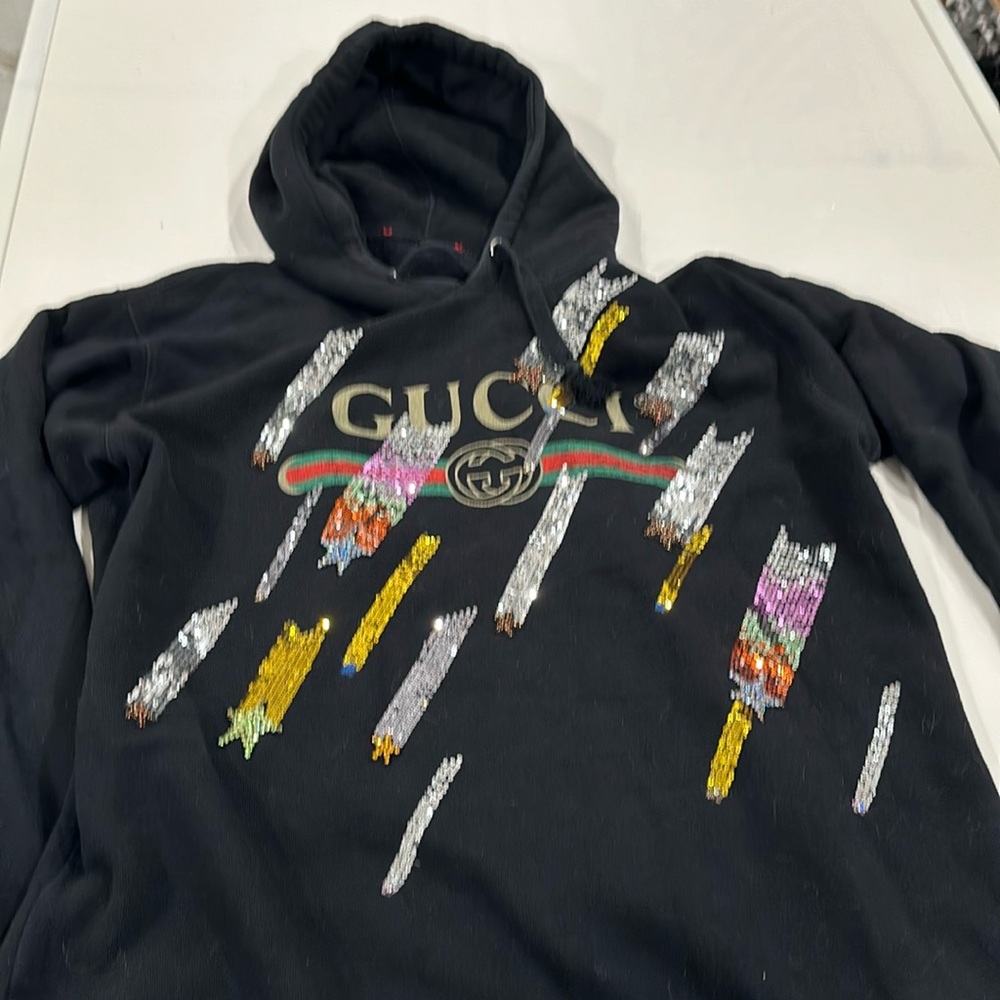 Black Gucci hoodie.  Fits like a womens size large